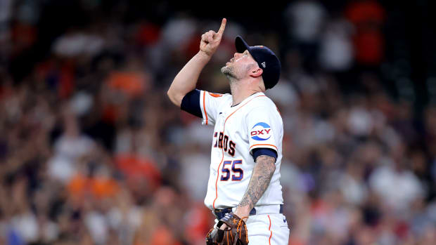Sep 13, 2023; Houston, Texas, USA; Houston Astros relief pitcher Ryan Pressly (55) reacts after the final out against the Oakland Athletics during the ninth inning at Minute Maid Park. Mandatory Credit: Erik Williams-USA TODAY Sports  